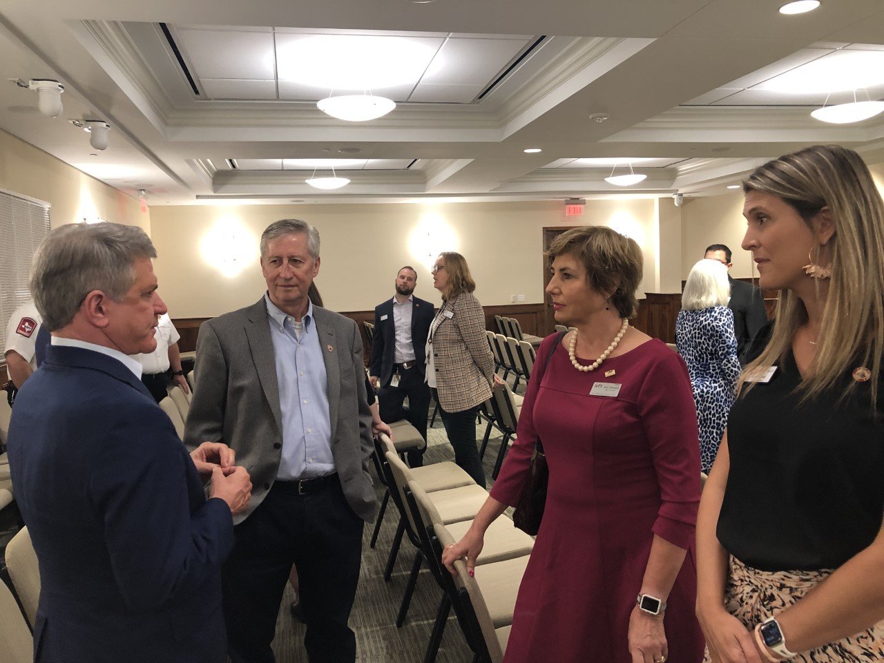 U.S. Rep. Mike McCaul visits with Mayor Dusty Thiele, Katy school trustee Dawn Champagne and Ward B Council Member Gina Hicks at a small ceremony Thursday morning at City Hall.